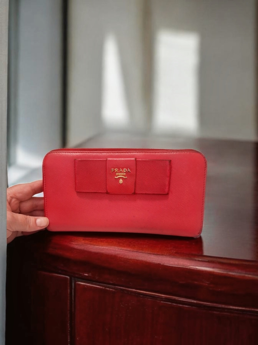 Prada Red Saffiano Zip Wallet with Bow Accent